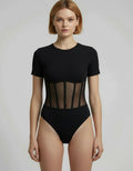ROMAR ribbed corset mesh panel bodysuit featuring a fitted design with ribbed texture and mesh accents for a stylish look.
