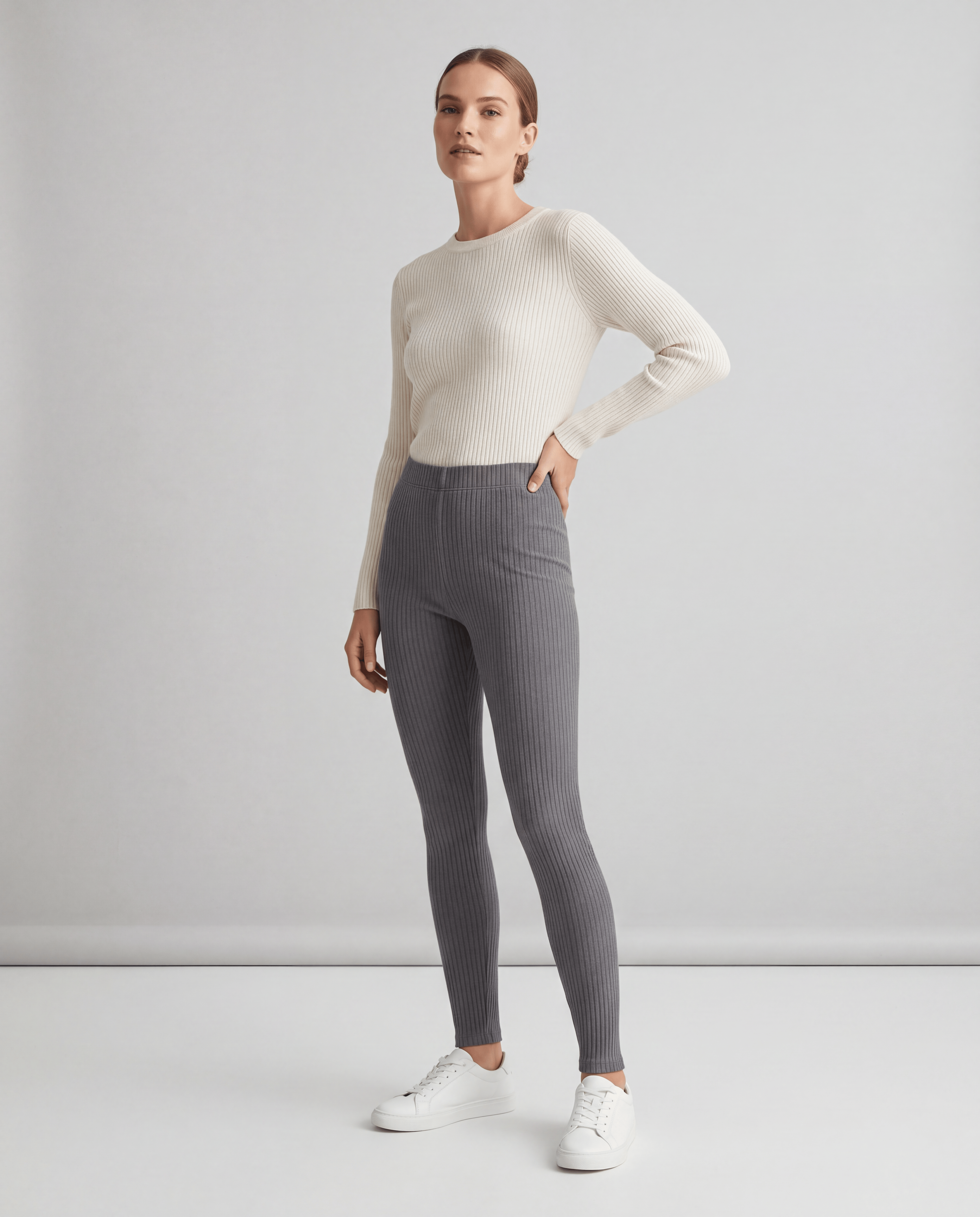 Black ribbed slim fit leggings by ROMAR, featuring a stretchy ribbed fabric and a snug, figure-hugging design.