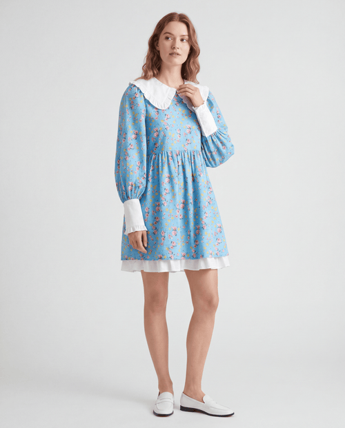 ROMAR floral ruffle babydoll mini dress with Peter Pan collar, featuring a delicate floral pattern and ruffled neckline.