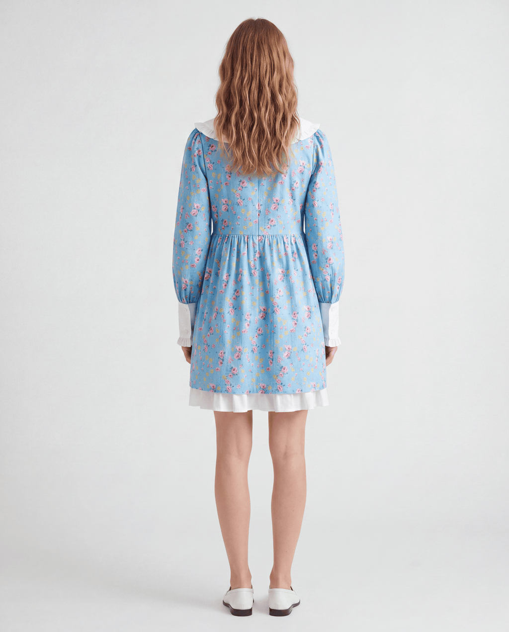 Romar floral ruffle baby doll mini dress with Peter Pan collar, featuring a charming and feminine design.