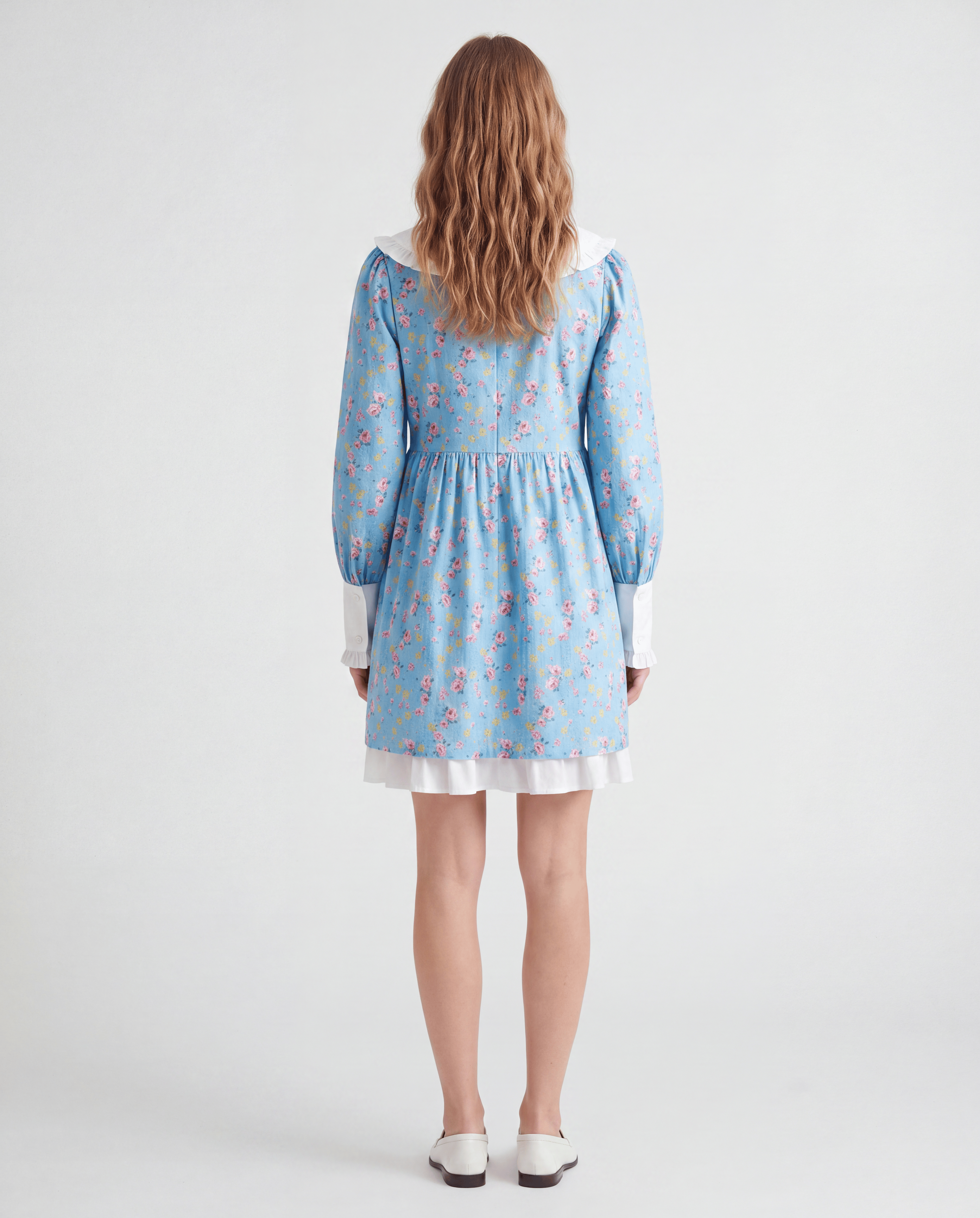 Romar floral ruffle baby doll mini dress with Peter Pan collar, featuring a charming and feminine design.