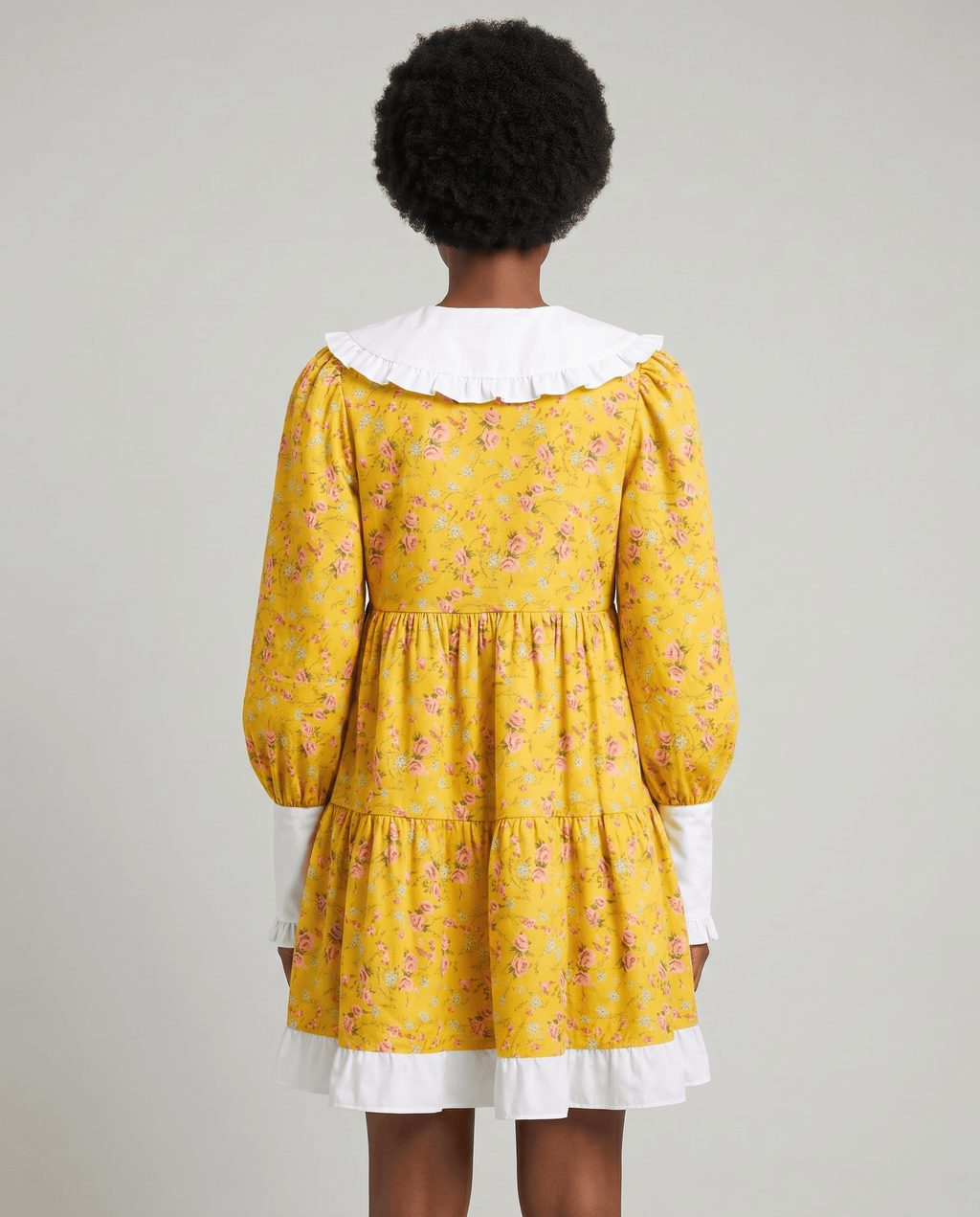 ROMAR floral ruffle babydoll mini dress with Peter Pan collar, featuring feminine floral print and ruffled details.