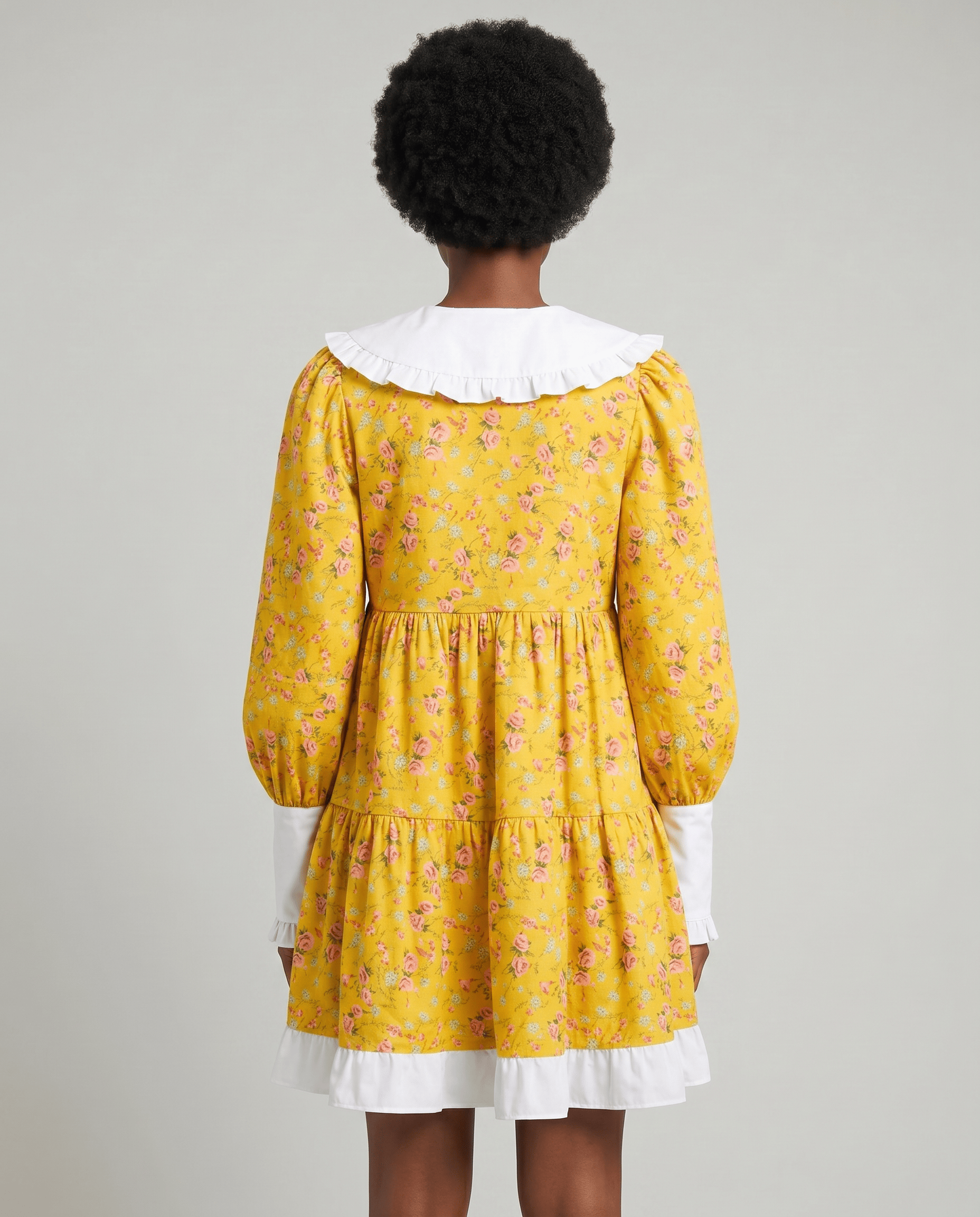 ROMAR floral ruffle babydoll mini dress with Peter Pan collar, featuring feminine floral print and ruffled details.