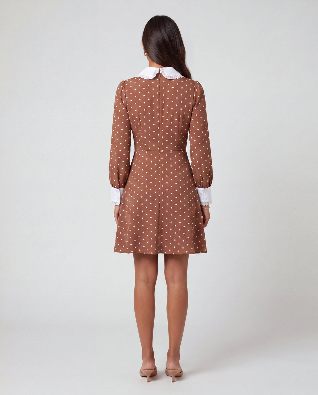 Romar polka dot Peter Pan collar mini dress with long sleeves and a fitted waist, perfect for casual or semi-formal wear.