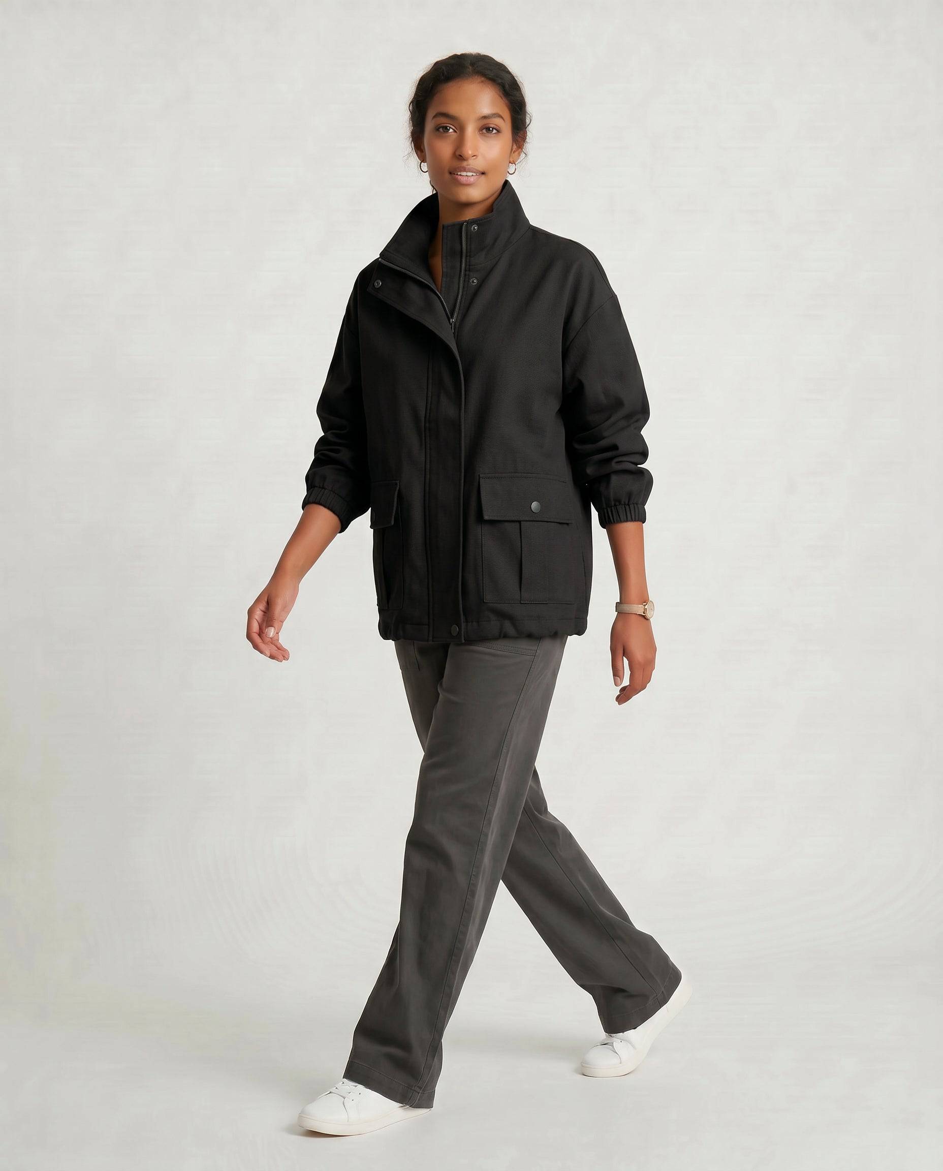 ROMAR oversized utility windbreaker jacket in lightweight, durable fabric with adjustable hood and multiple front pockets.