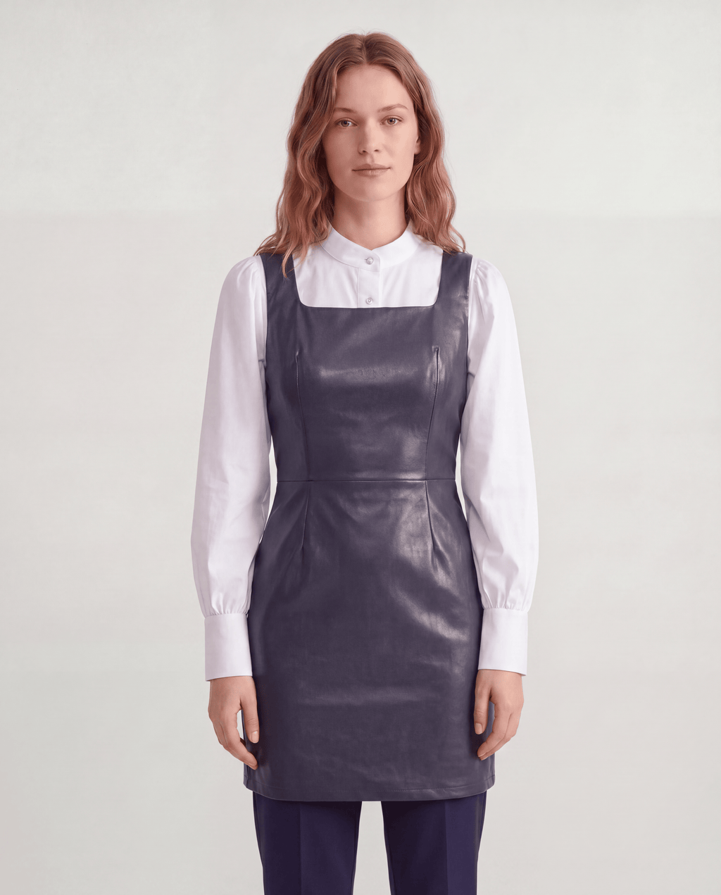 ROMAR faux leather pinafore and blouse two-piece dress set featuring a stylish pinafore over a blouse, perfect for chic everyday wear.