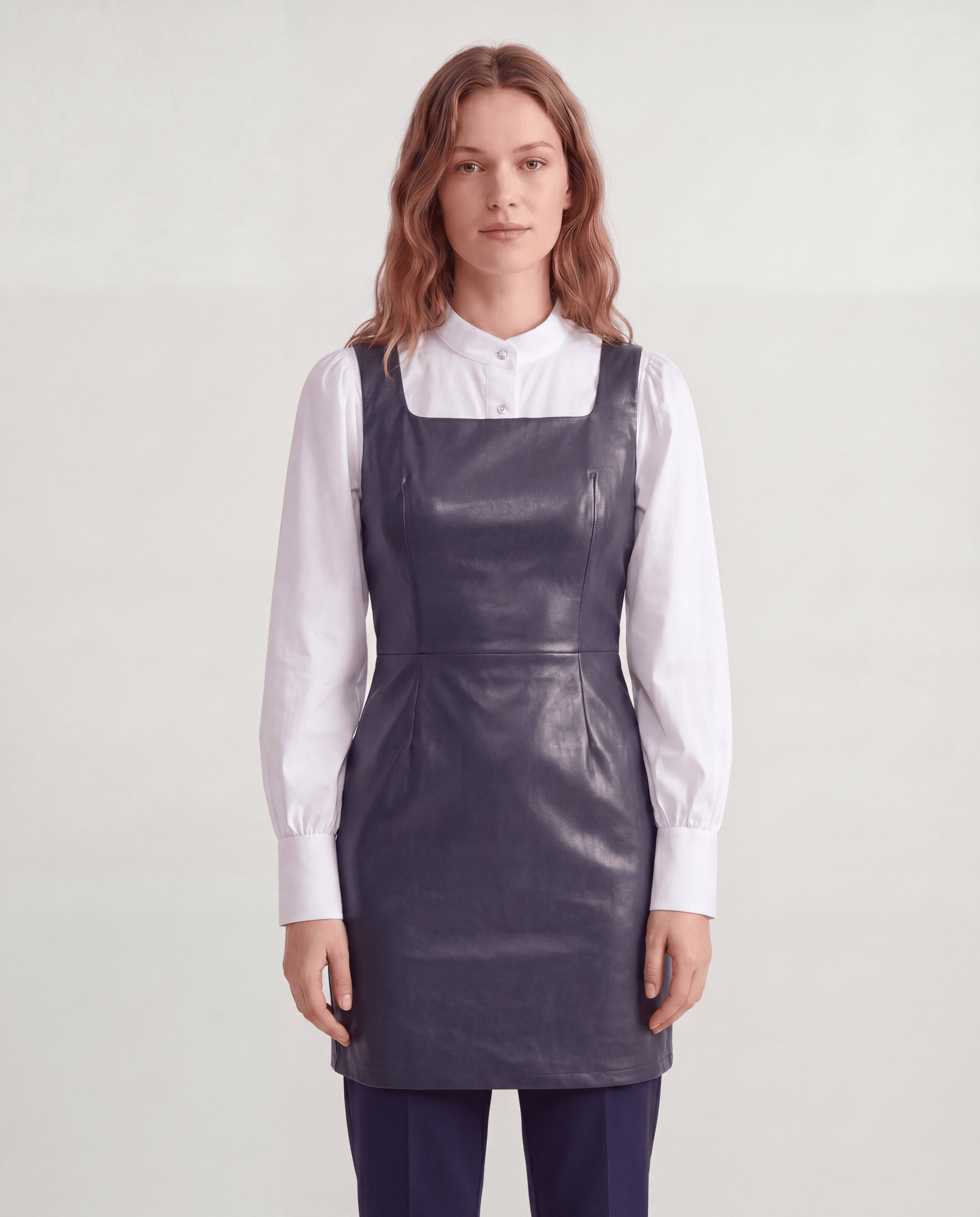 ROMAR faux leather pinafore and blouse two-piece dress set featuring a stylish pinafore over a blouse, perfect for chic everyday wear.