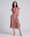 ROMAR printed ruffle wrap midi dress featuring a floral pattern and flowing fabric, styled with ruffled details and a waist tie.