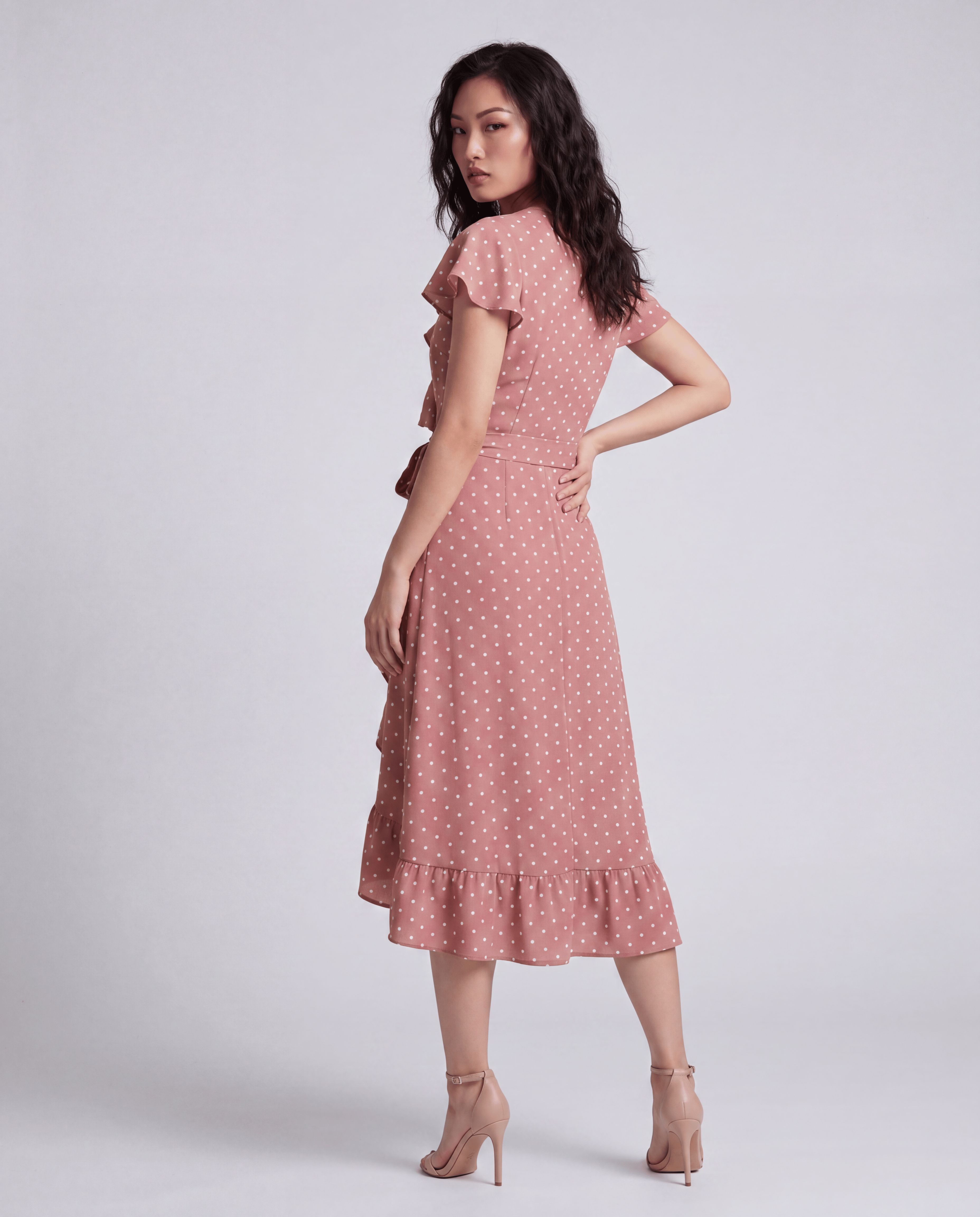 ROMAR printed ruffle wrap midi dress with floral pattern, featuring ruffled sleeves and a fitted waist on a model.
