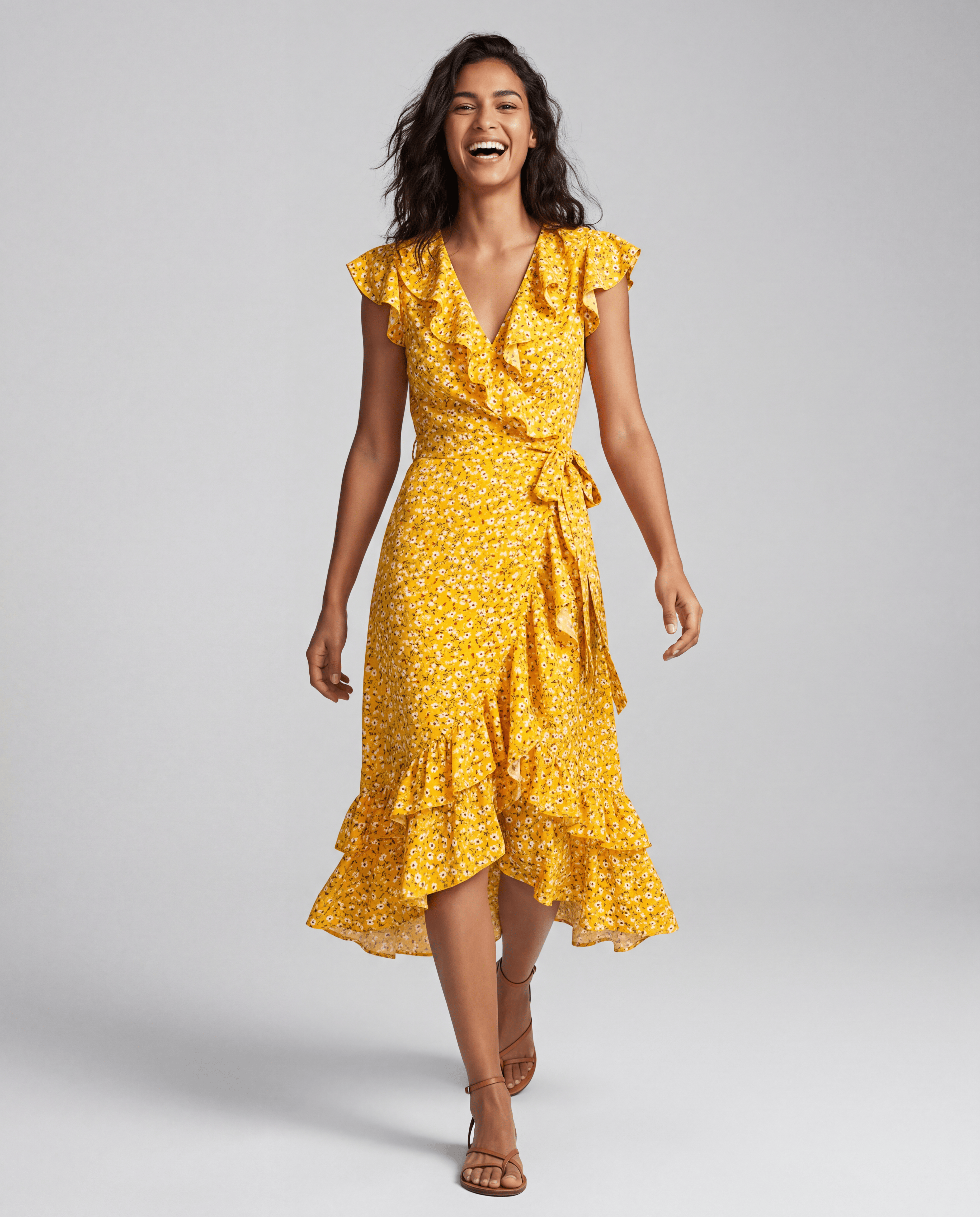 ROMAR printed ruffle wrap midi dress featuring a flowy silhouette and floral pattern, perfect for stylish occasions.