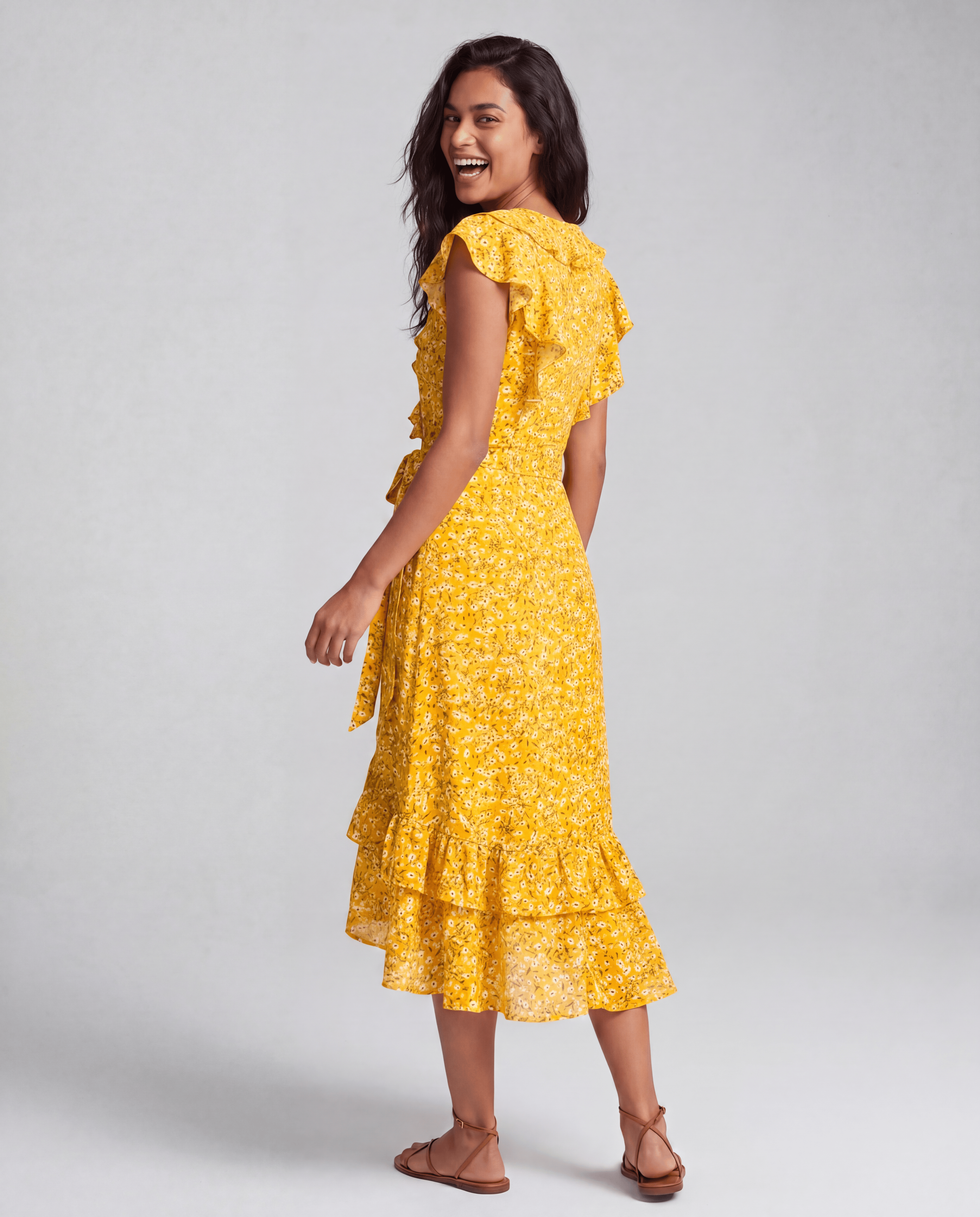 ROMAR printed ruffle wrap midi dress featuring a flowy fabric and elegant design, ideal for stylish occasions.