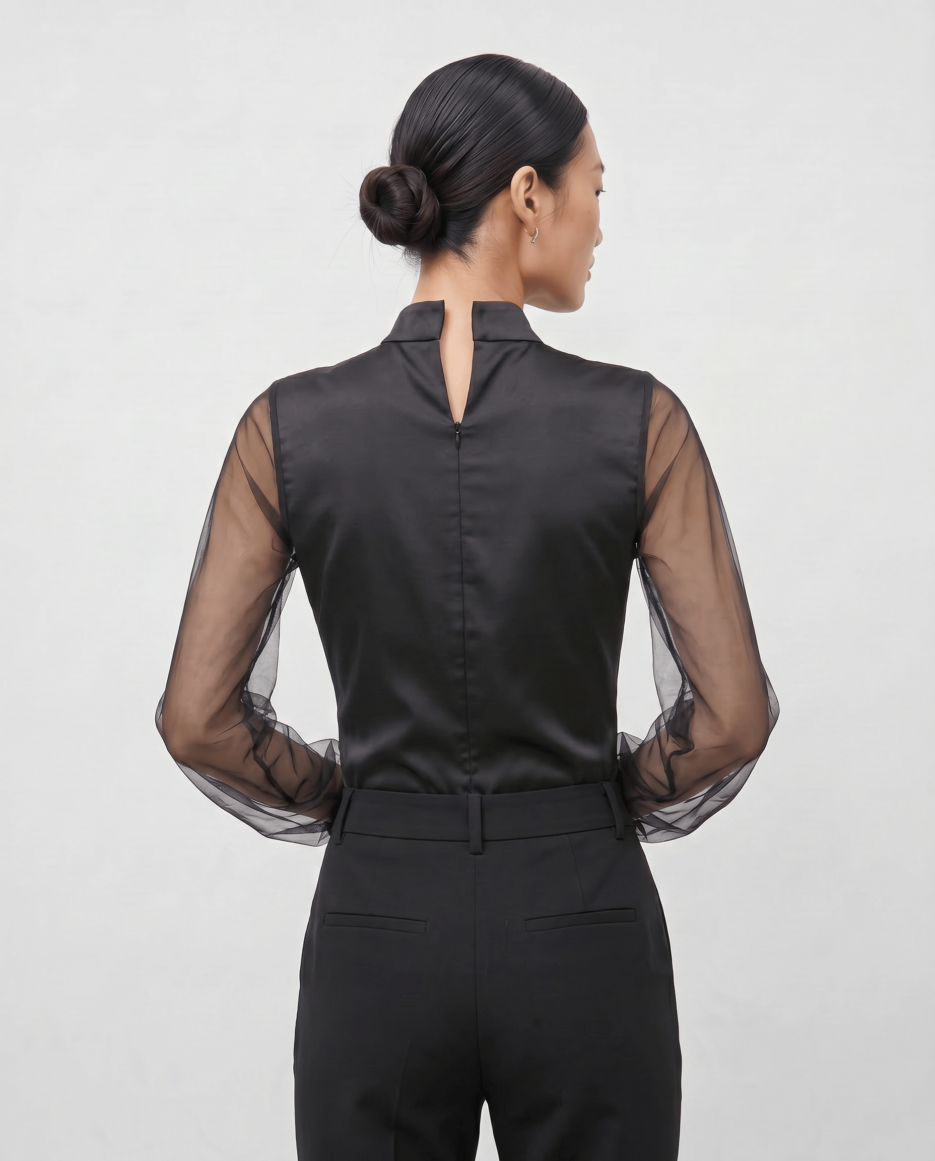 ROMAR high neck ruffle mesh sleeve bodysuit with zip back, featuring elegant ruffle details and fitted design.