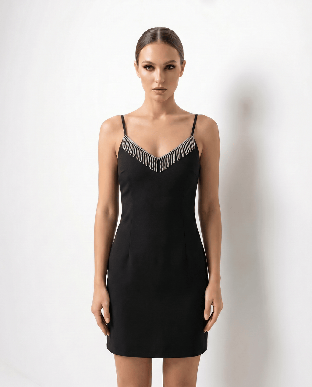 ROMAR Crystal Fringe V-Neck Mini Dress with sparkling embellishments and flowing fringe detail on a model.