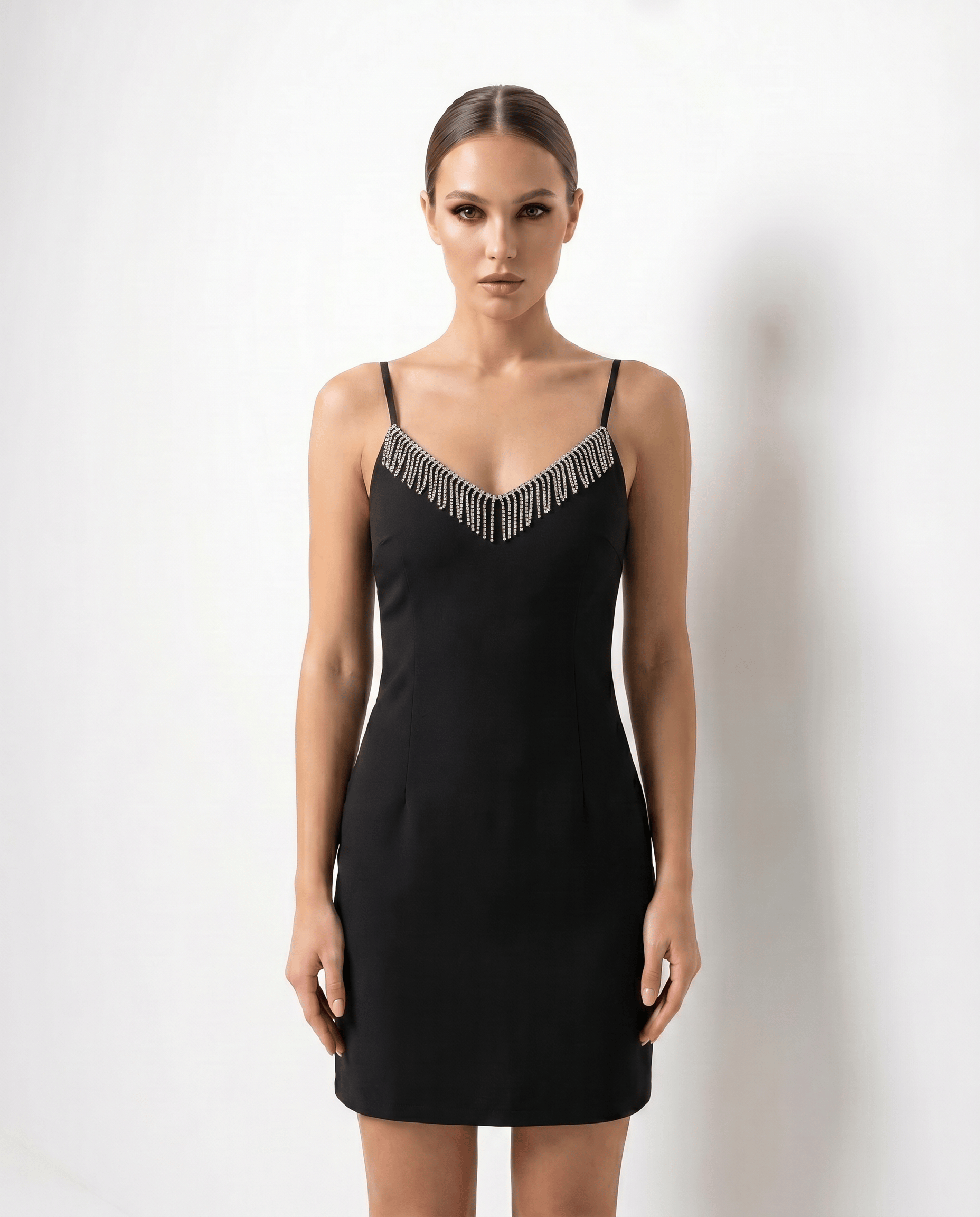 ROMAR Crystal Fringe V-Neck Mini Dress with sparkling embellishments and flowing fringe detail on a model.