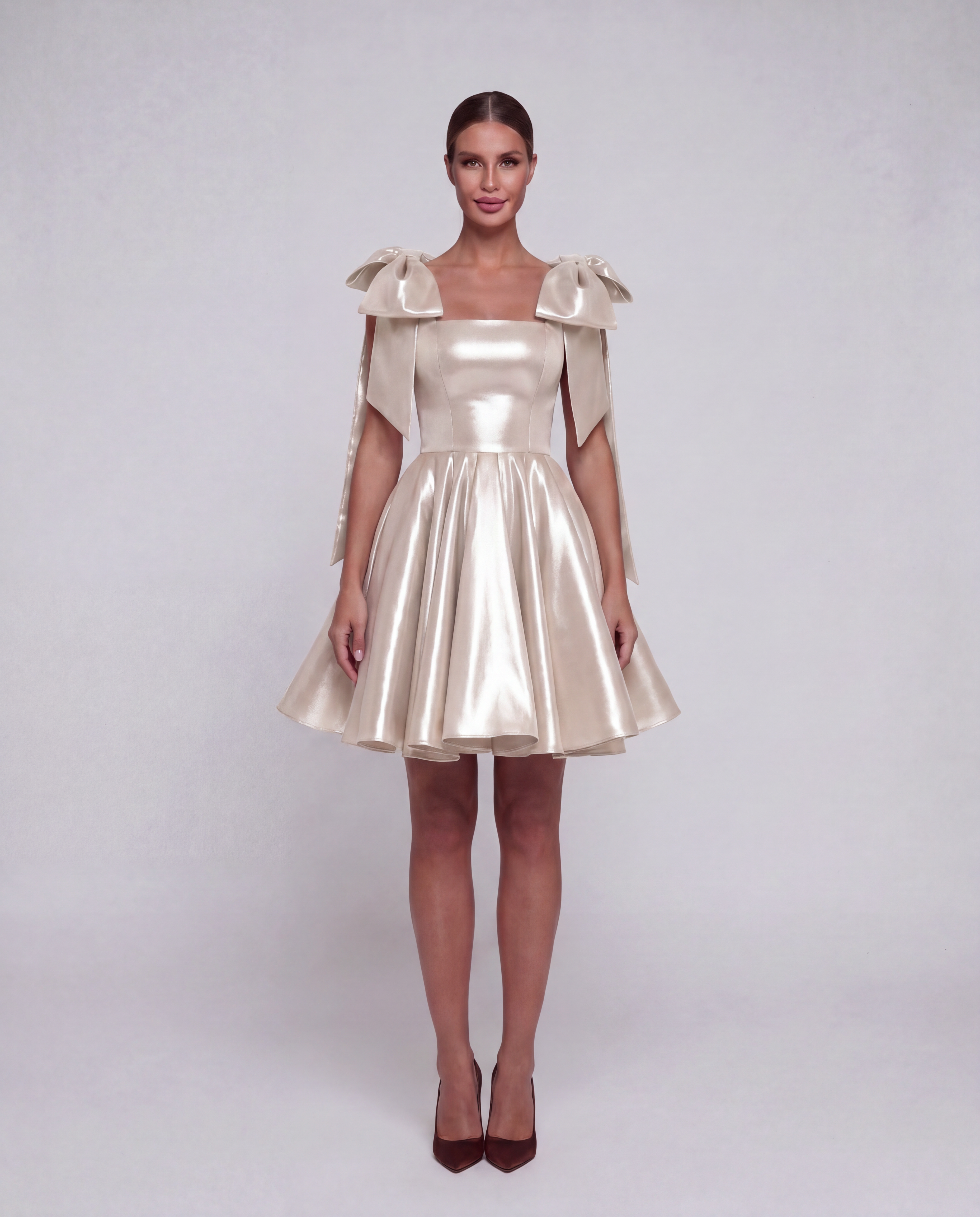 ROMAR satin corset mini dress with bow back, sleek and stylish, featuring a fitted silhouette and elegant design.