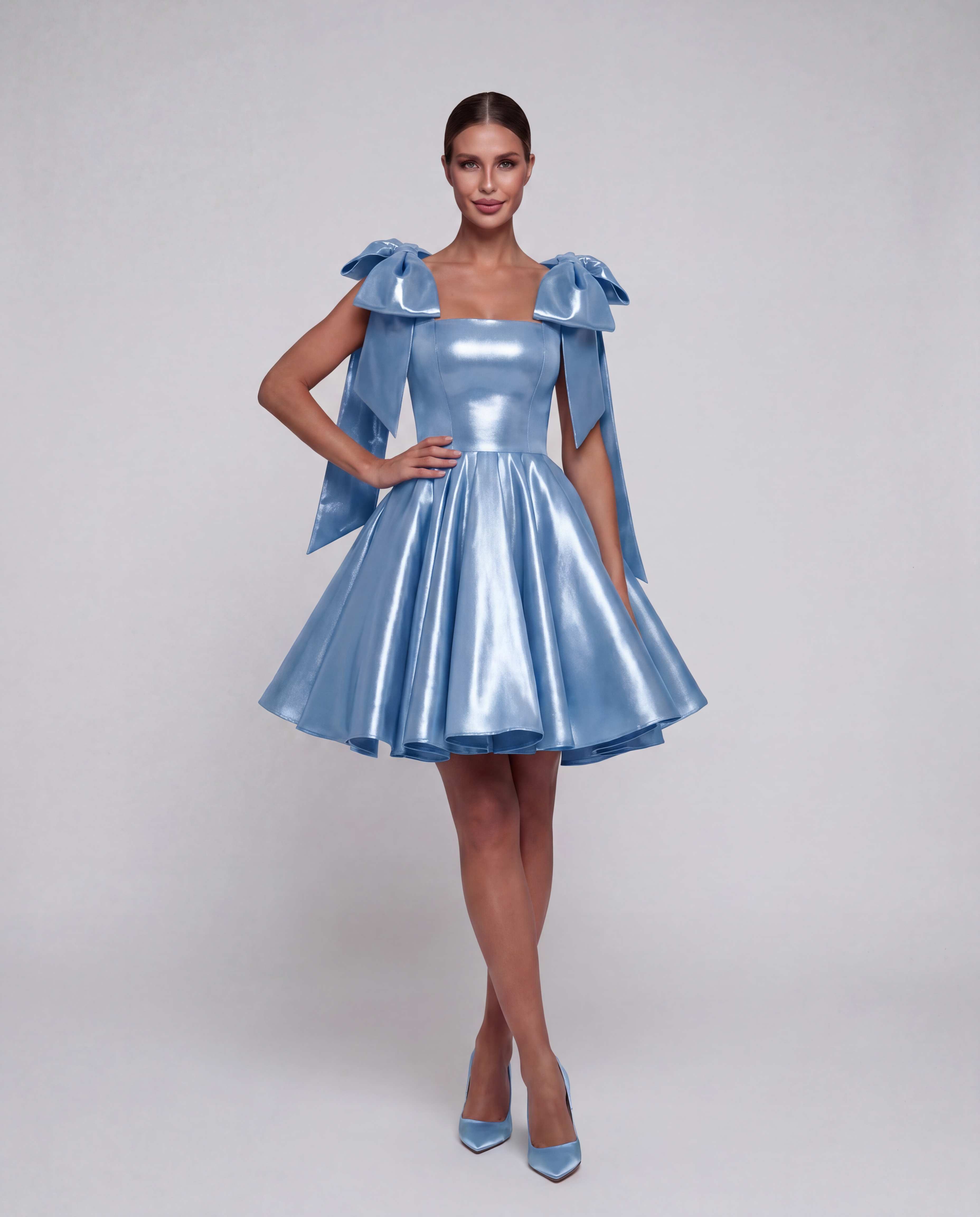 ROMAR satin corset mini dress with bow back, featuring a fitted silhouette and elegant design, perfect for stylish evening wear.