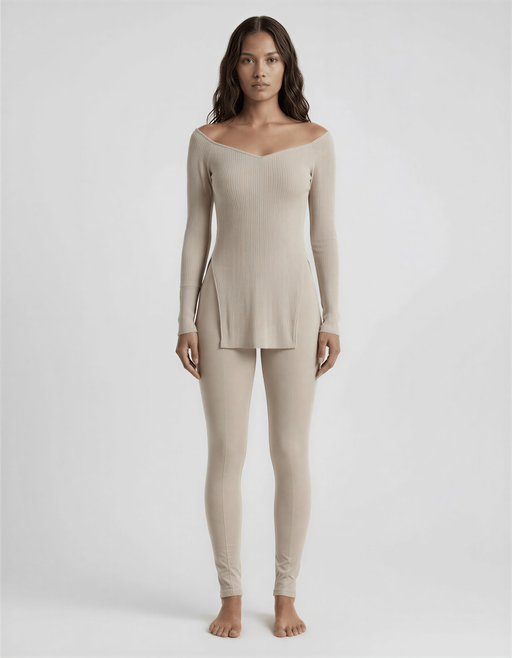 ROMAR ribbed off-shoulder longline top, soft fabric with fitted ribbed design and long sleeves, styled on a model.