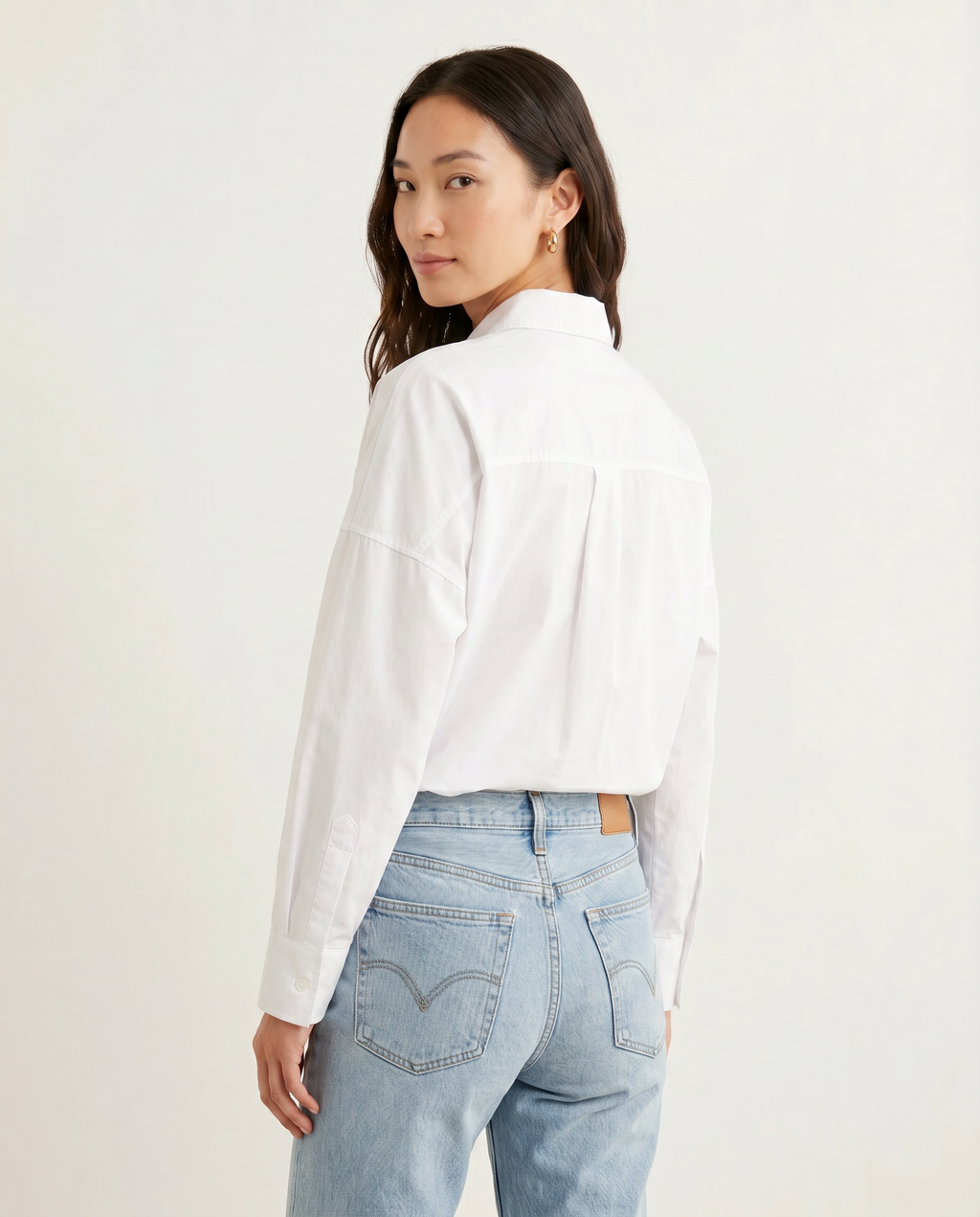 ROMAR Atelier oversized cotton shirt, casual long-sleeve tops with a relaxed fit, soft white fabric, and classic collar.